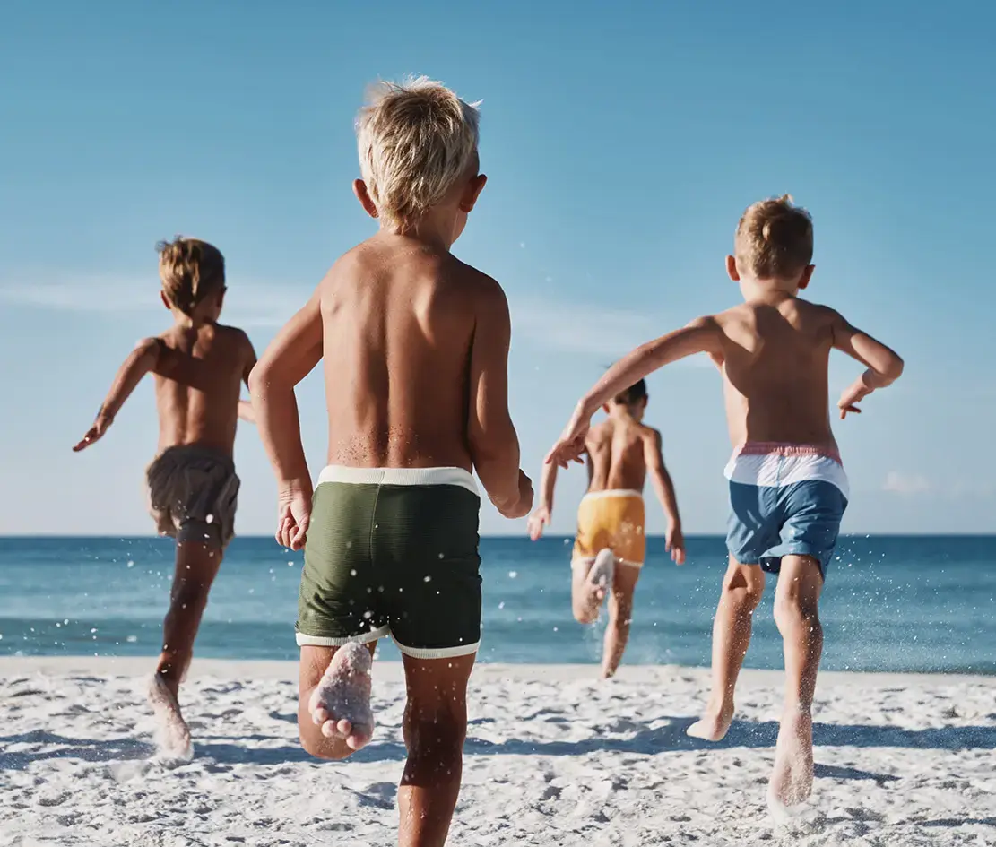 alys-beach-family-kid-running-to-ocean